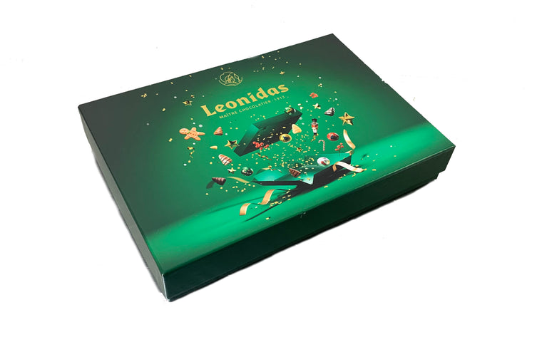Green Leonidas chocolate box with decorative design on a white background